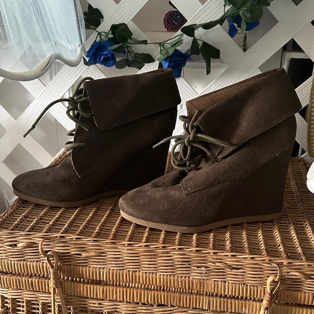High wedges brown/green color. Lace up. No major flaws in faux suede.Ending soon